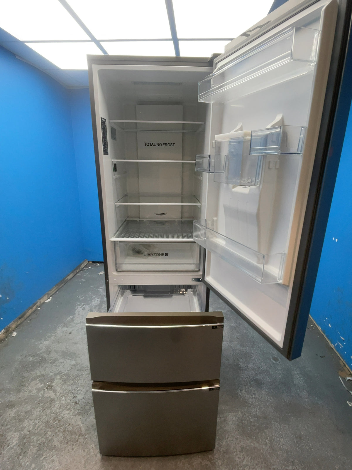 #GRC-165-965 - Haier HETR3619FWMG 60cm 70/30 Fridge Freezer – Total No Frost, Non-Plumbed Water Dispenser, MyZone Drawer, Silver